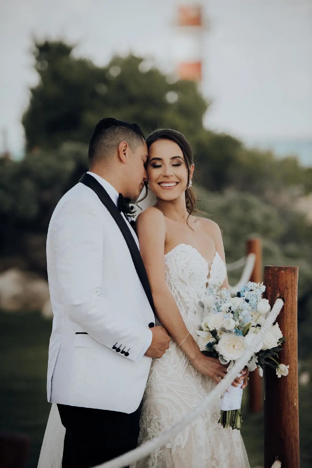 April Wears Strapless, Lace Bridal Dress For Beach Wedding in Mexico. Desktop Image
