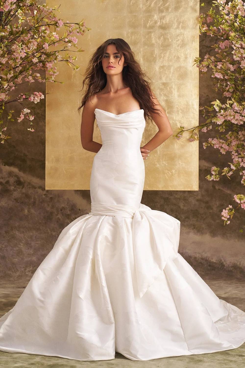 Ines Di Santo strapless mermaid wedding dress with dramatic structured flare