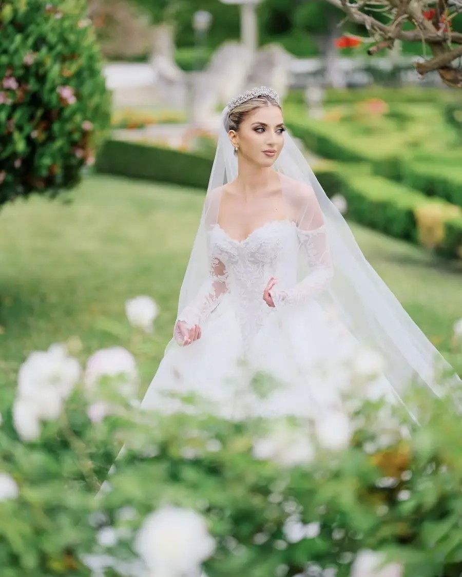 Stineh Wears Romantic, Floral Lace Ball Gown Wedding Dress Image