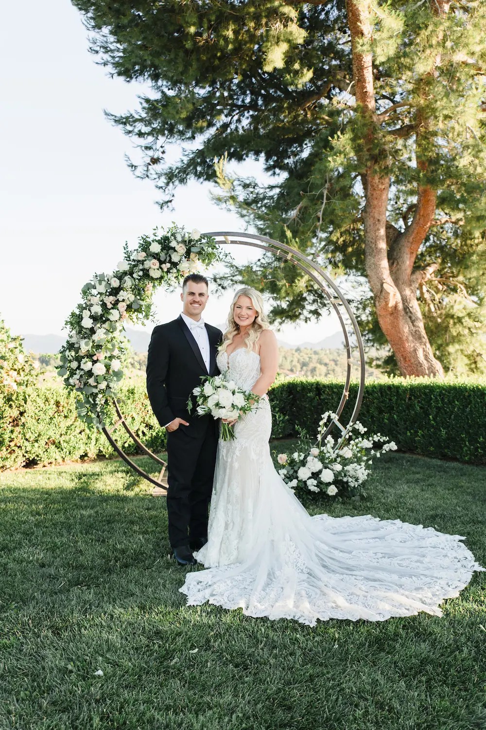 Cassy Wears Lace Wedding Dress With Long Train. Mobile Image