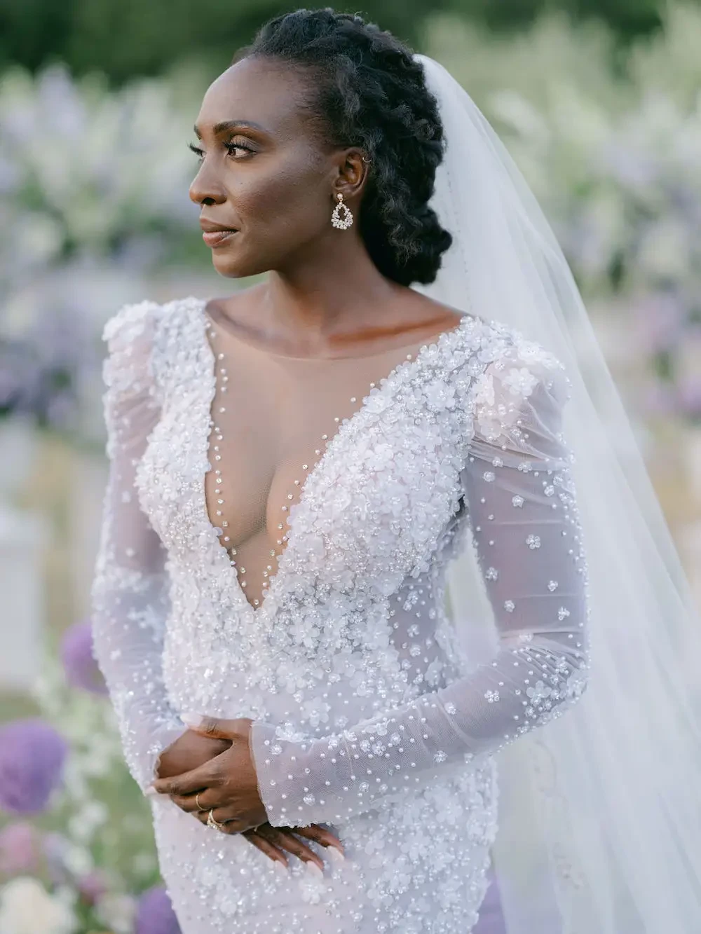 Agatha Wears Long Sleeve, Illusion Lace Wedding Dress with Pearls For Destination Wedding Image