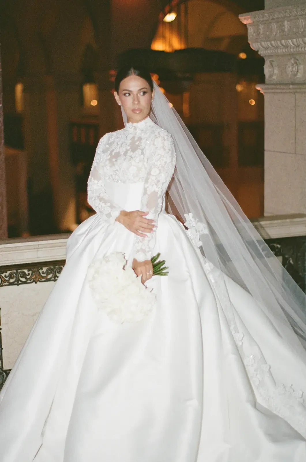 Stacy Wears a Classic Long Sleeve Lace Wedding Dress at The Majestic Downtown Los Angeles. Mobile Image