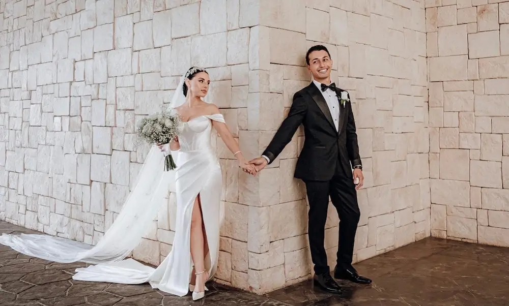 Stella Wears Minimalist, Off the Shoulders Wedding Dress For Destination Wedding. Mobile Image