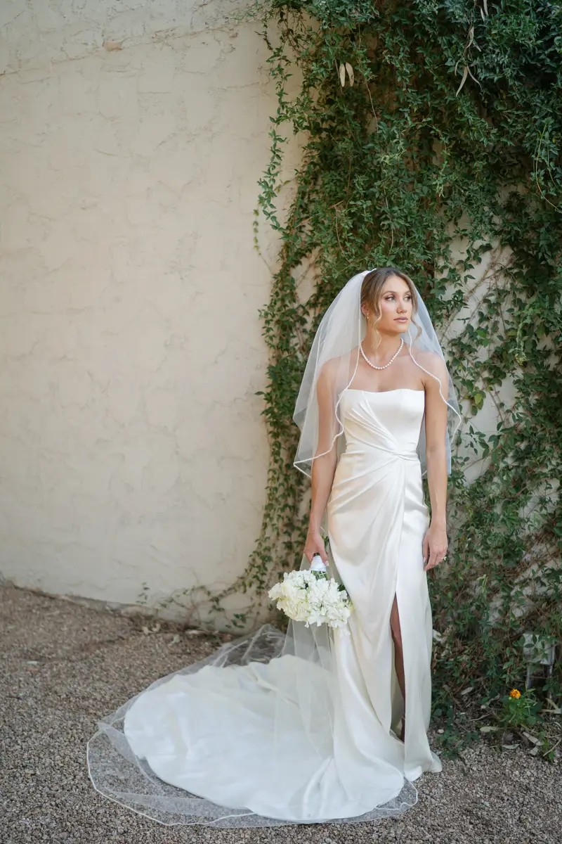 Callie Wears Modern, Minimalist Strapless Wedding Dress. Desktop Image