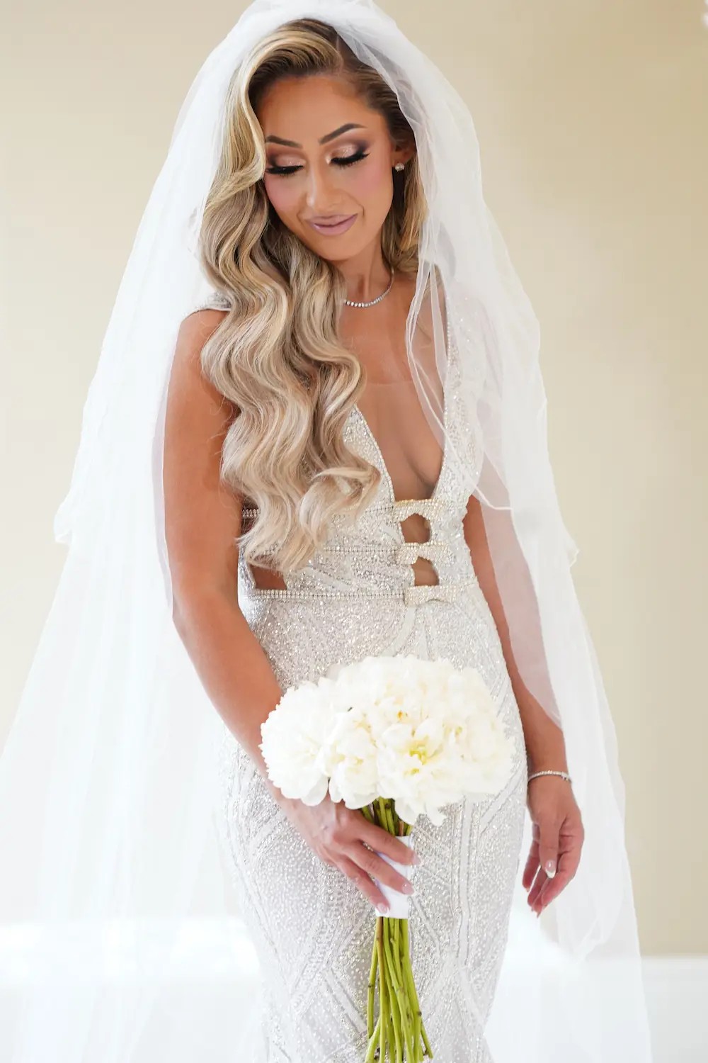 Adila Wears Beaded Sparkle V-Neck Wedding Dress. Mobile Image